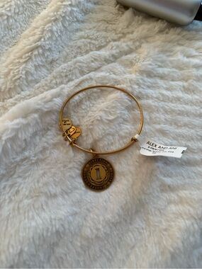 Alex and Ani Gold One Direction Round Logo Charm Bangle